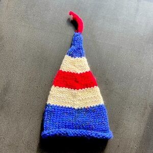 Hand-knit red, white and blue kids’ chunky winter beanie.